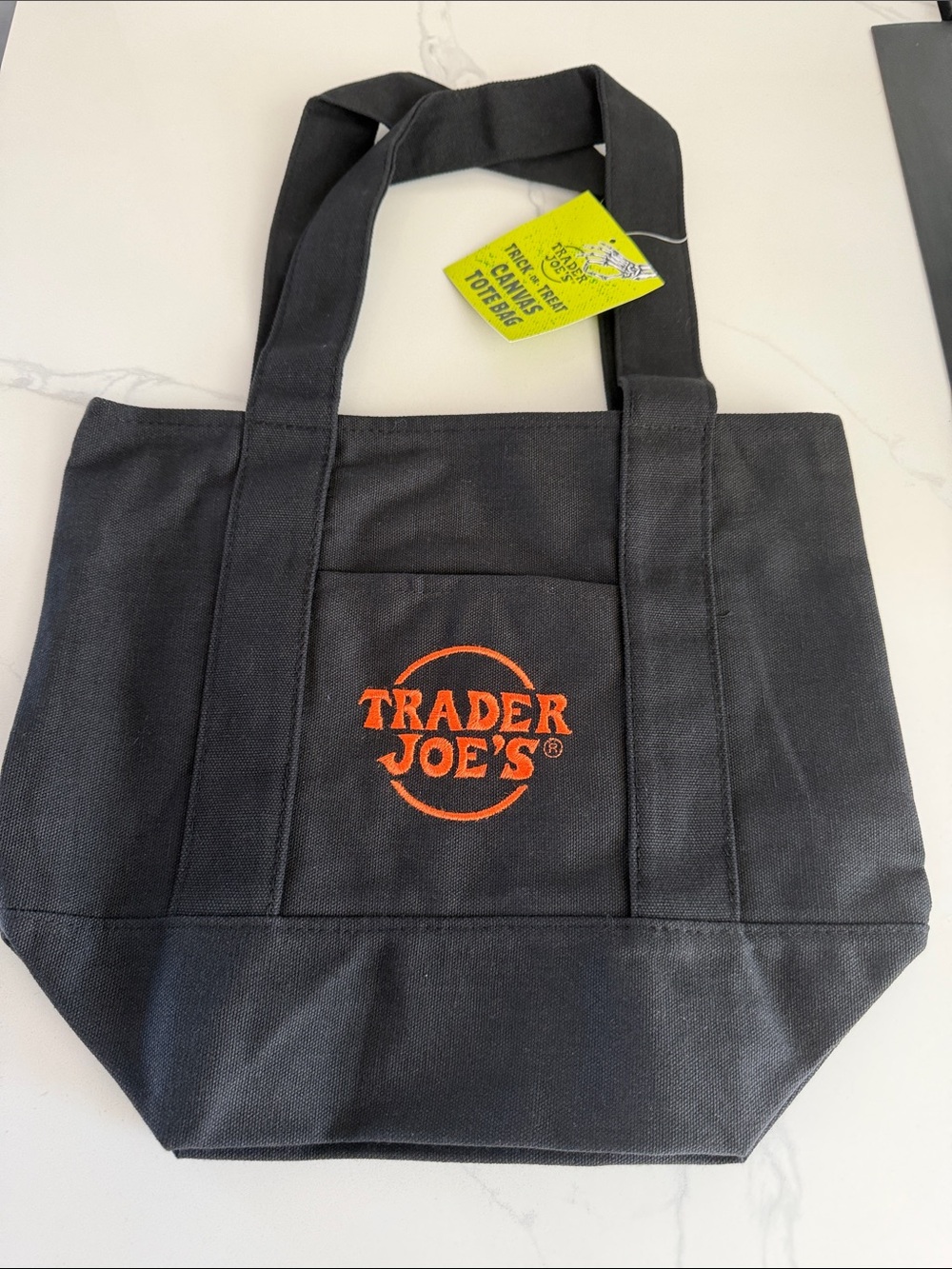 Trader Joe’s Halloween Black Tote Bag with Orange Logo. trick-or-Treat